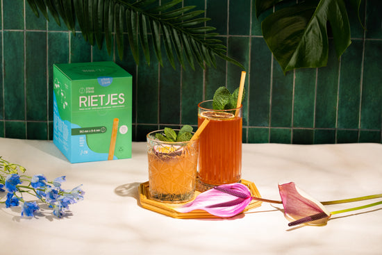 Straw by Straw cocktails with botanical green background